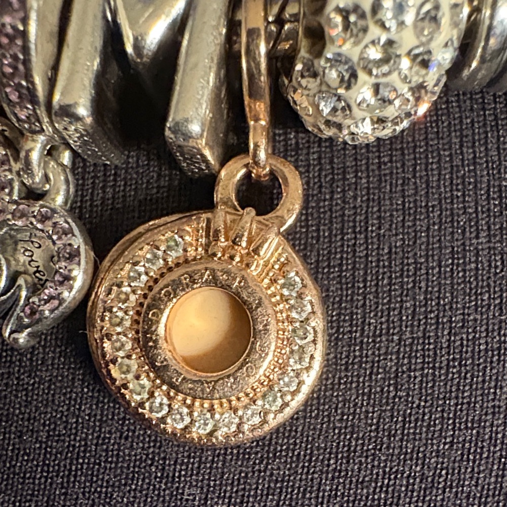 Elegant Gold and Silver Charm Bracelet